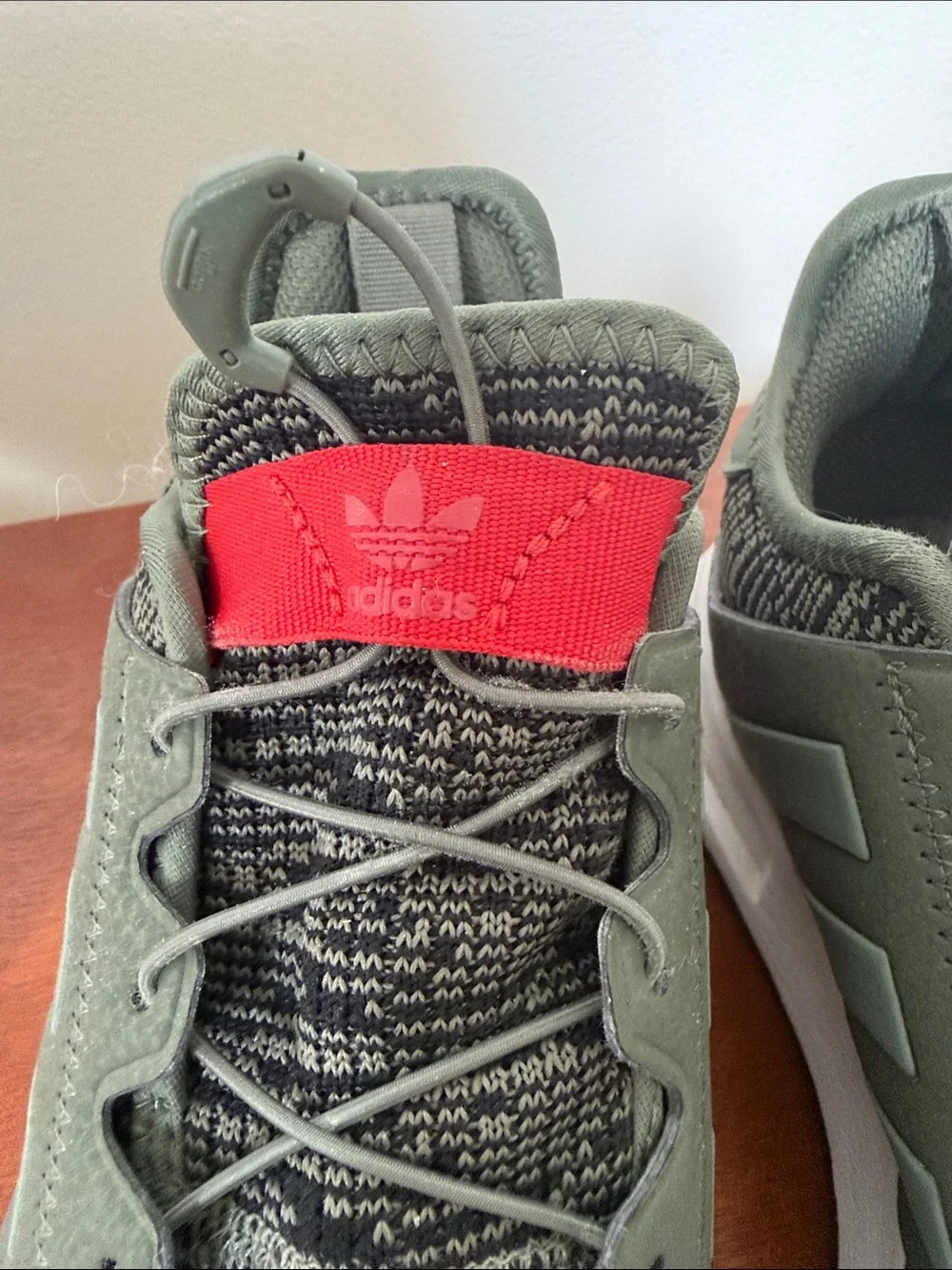 adidas Men’s Olive Green and Gray Knit Sneakers with Red Tongue Accent